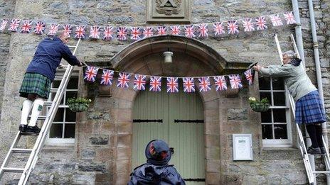 Residents in Blair Atholl hanging Union flags