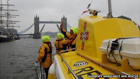 Guernsey marine ambulance Flying Christine III heading towards Tower Bridge as part of the Diamond Jubilee Pageant