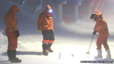 Members of the British Antarctic Survey playing croquet