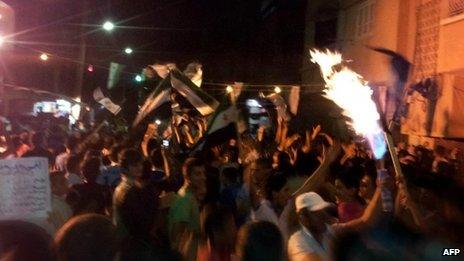 Syrians demonstrate in the town of Deir al-Zor in a handout picture released by Shaam News Network 3 June 2012