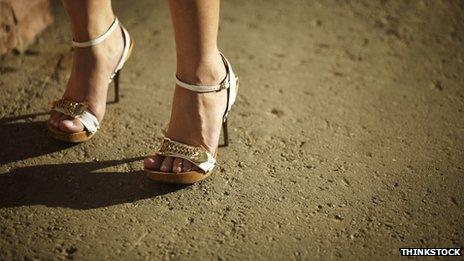 Woman's feet wearing high heels