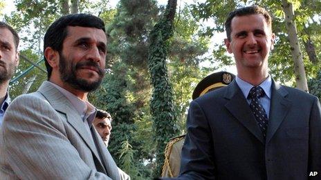 Iranian President Ahmadinejad and Syrian President Assad at a welcoming ceremony in Tehran in August 2005.