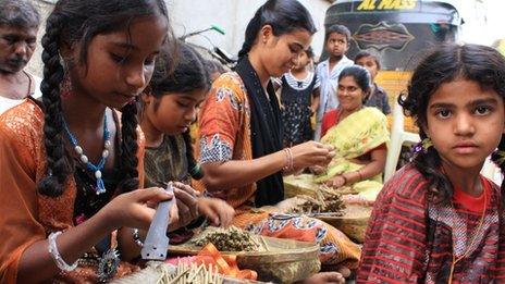 Young girls rolling beedis in Kadiri