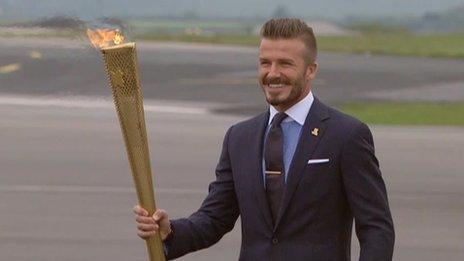 David Beckham with the Olympic torch