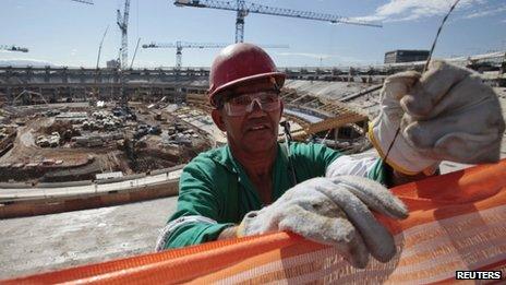 A worker at the Maracana Stadium in Rio de Janeiro on 11 June 2012