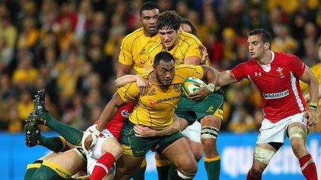 Australia prop Sekope Kepu carries the ball against Wales