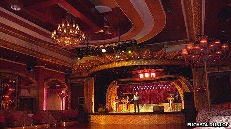 A band rehearses in the dance hall