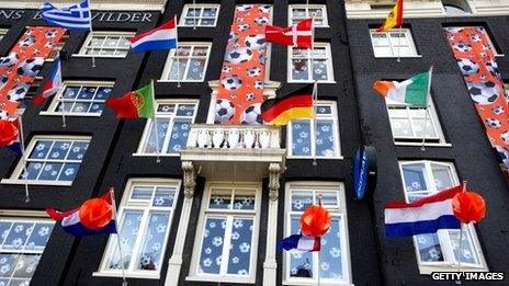 Flags flying from flats in Amsterdam