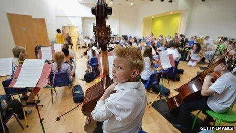 Children from the Big Noise Orchestra rehearse for The Big Concert