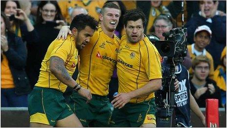 Rob Horne celebrates his try