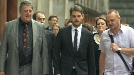 Paul Chambers arriving at court with Stephen Fry and Al Murray