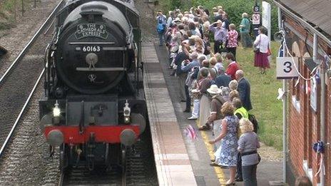 Steam train arriving at Goring and Streatley station