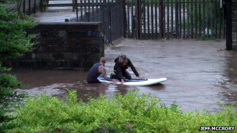 Surfer rescues woman