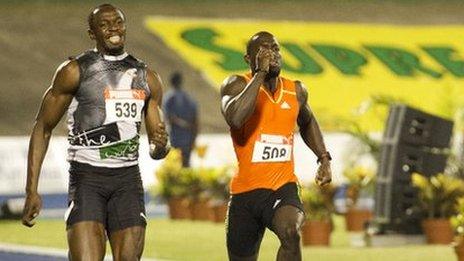 Usain Bolt runs for the line in the 200m