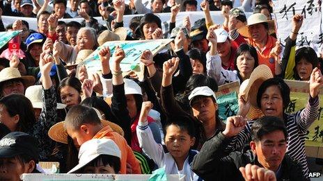 Wukan villagers protesting over illegal land grabs and the death of a local leader, 19 December 2011