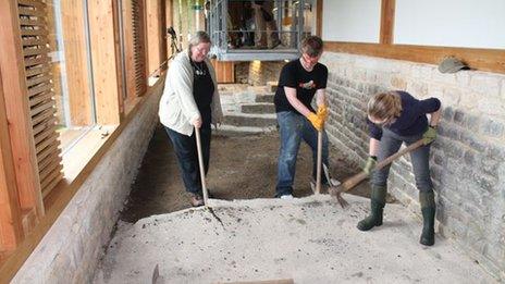 Archaeologists at work on the mosaic