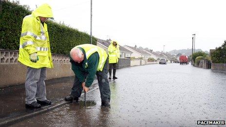 Workers check drains in Newcastle