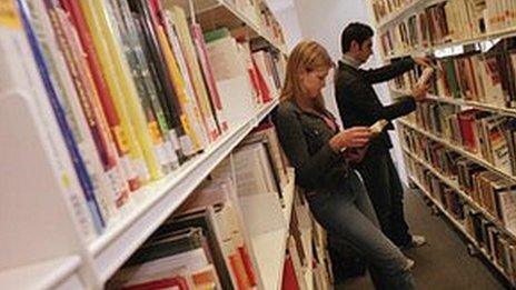 People reading in a library