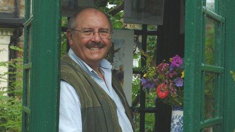 John Hay in his art gallery. Photo by Phil Hunt.