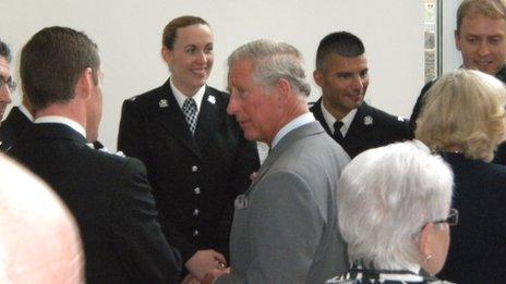 Prince Charles speaking to police