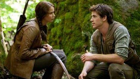 Jennifer Lawrence and Liam Hemsworth in The Hunger Games