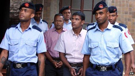 Sandip Moneea, 43 (centre left) and Avinash Treebhoowoon, 32 ( centre right)