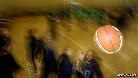 Youth club children plays basketball