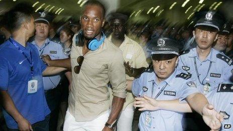 Didier Drogba arrives in Shanghai, 14 July