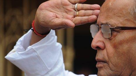 Pranab Mukherjee saluting