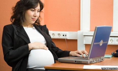 Pregnant woman in an office