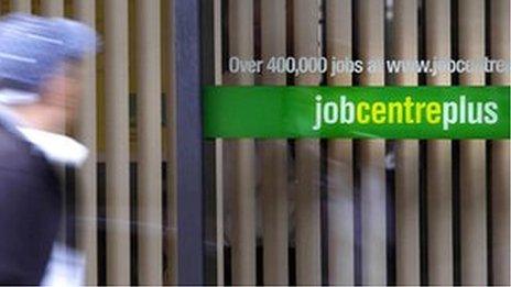 Man walking past job centre