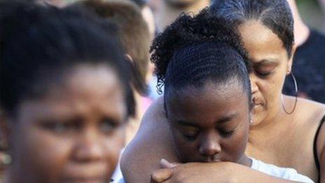 Mourners by the Century cinema in Aurora