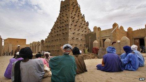 Men outside the Mosque of Sankore in Timbuktu, Mali, in February 2005