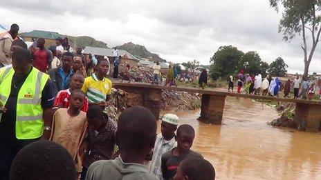 Rescue workers in Jos, Nigeria, following the floods