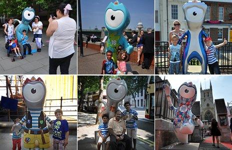 People pose with mascots