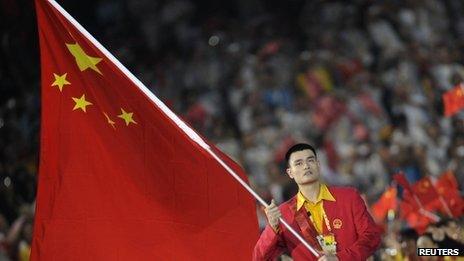 File photo of Yao Ming carrying the Chinese national flag during the opening ceremony of the Beijing 2008 Olympic Games