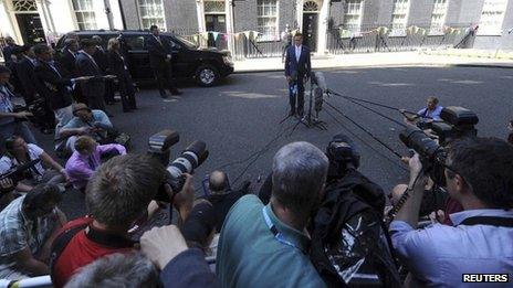 US Republican presidential candidate Mitt Romney talks to the media in Downing Street after his meeting with British Prime Minister David Cameron in London, 26 July 2012