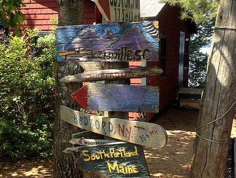 Signposts inside Pine Island summer camp
