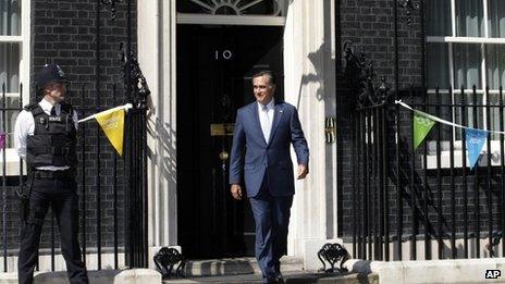 Republican presidential candidate Mitt Romney walks out of 10 Downing Street after meeting with British Prime Minister David Cameron in London, 26 July 2012