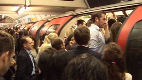 People struggling to get on a Central Line train on Tuesday morning