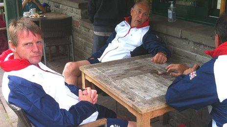 Team GB coach Stuart Pearce (left) relaxes in Cardiff's Bute Park ahead of Wednesday night's match