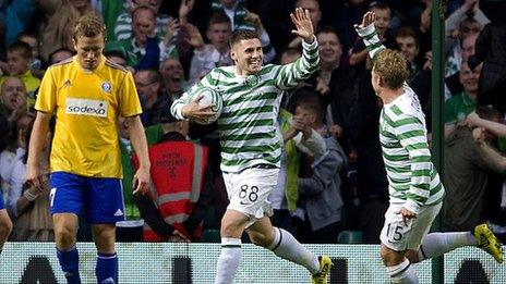 Gary Hooper celebrates with Kris Commons after scoring for Celtic against HJK Helsinki