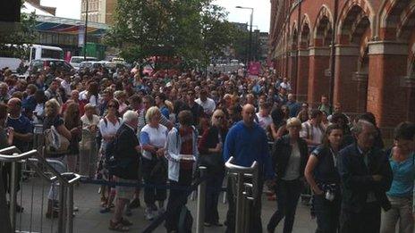 People waiting at St Pancras International station