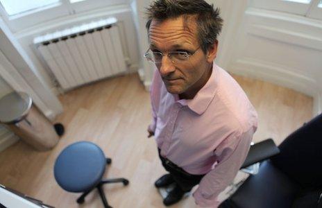 Michael Mosley checks his weight