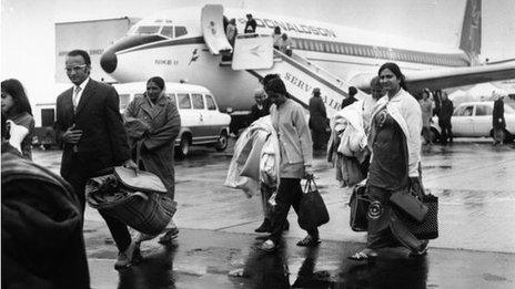 Ugandans arrive at Stansted Airport, UK