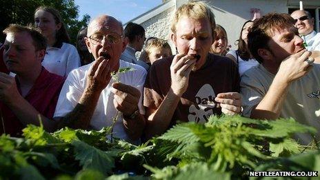 Alex Williams (second from left) eating nettles during the competition in 2004