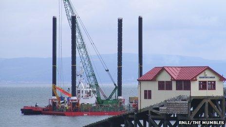 The barge next to the current Mumbles lifeboat station