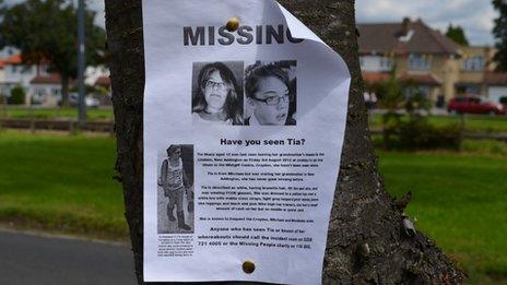 Missing person poster stuck to a tree