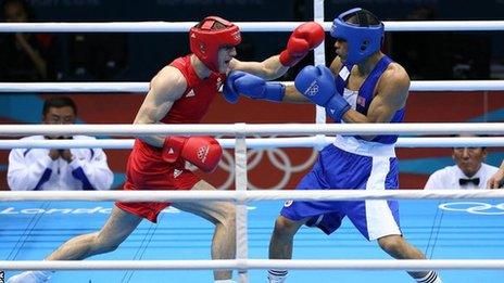 Thomas Stalker (red) in action against Mongolia's Munkh-Erdene Uranchimeg