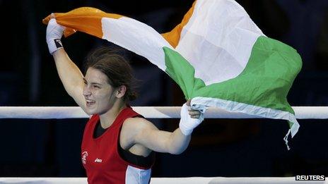 Katie Taylor waves Irish tricolour